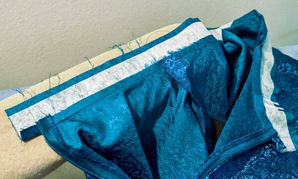 Ironing the seam towards the waistband How to make a circle skirt — ironing the seam towards the waistband