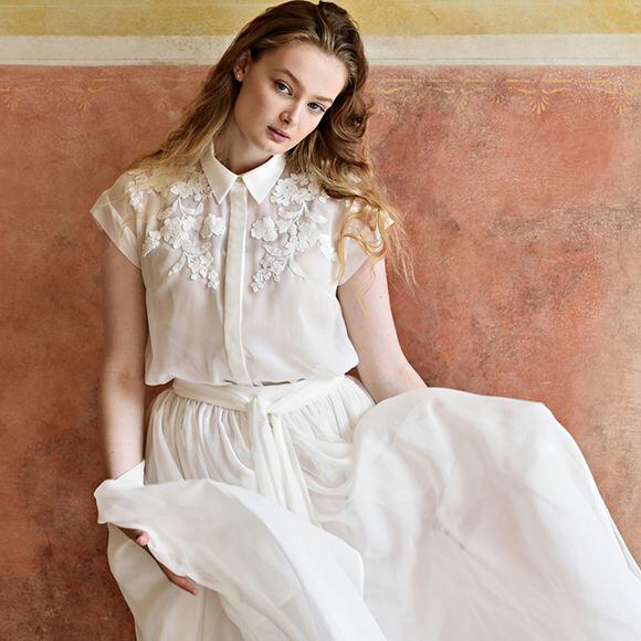 Wedding dresses from flowing bridal gown fabrics